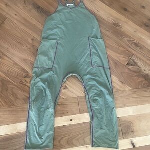 Green Jumpsuit with Purple Trim